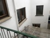Blick vom Balkon auf den kleinen Innenhof