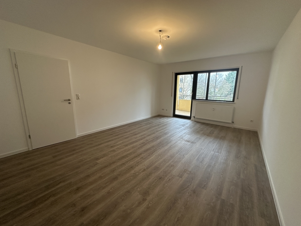 Modernisierte Wohnung mit Balkon in gepflegtem Wohnumfeld - Foto 1