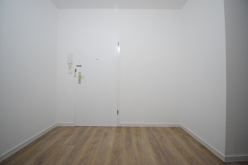 Modernisierte Wohnung mit Balkon in gepflegtem Wohnumfeld - Foto 4