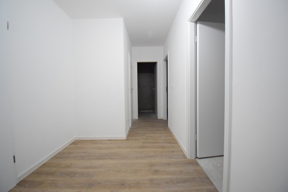 Modernisierte Wohnung mit Balkon in gepflegtem Wohnumfeld - Foto 5