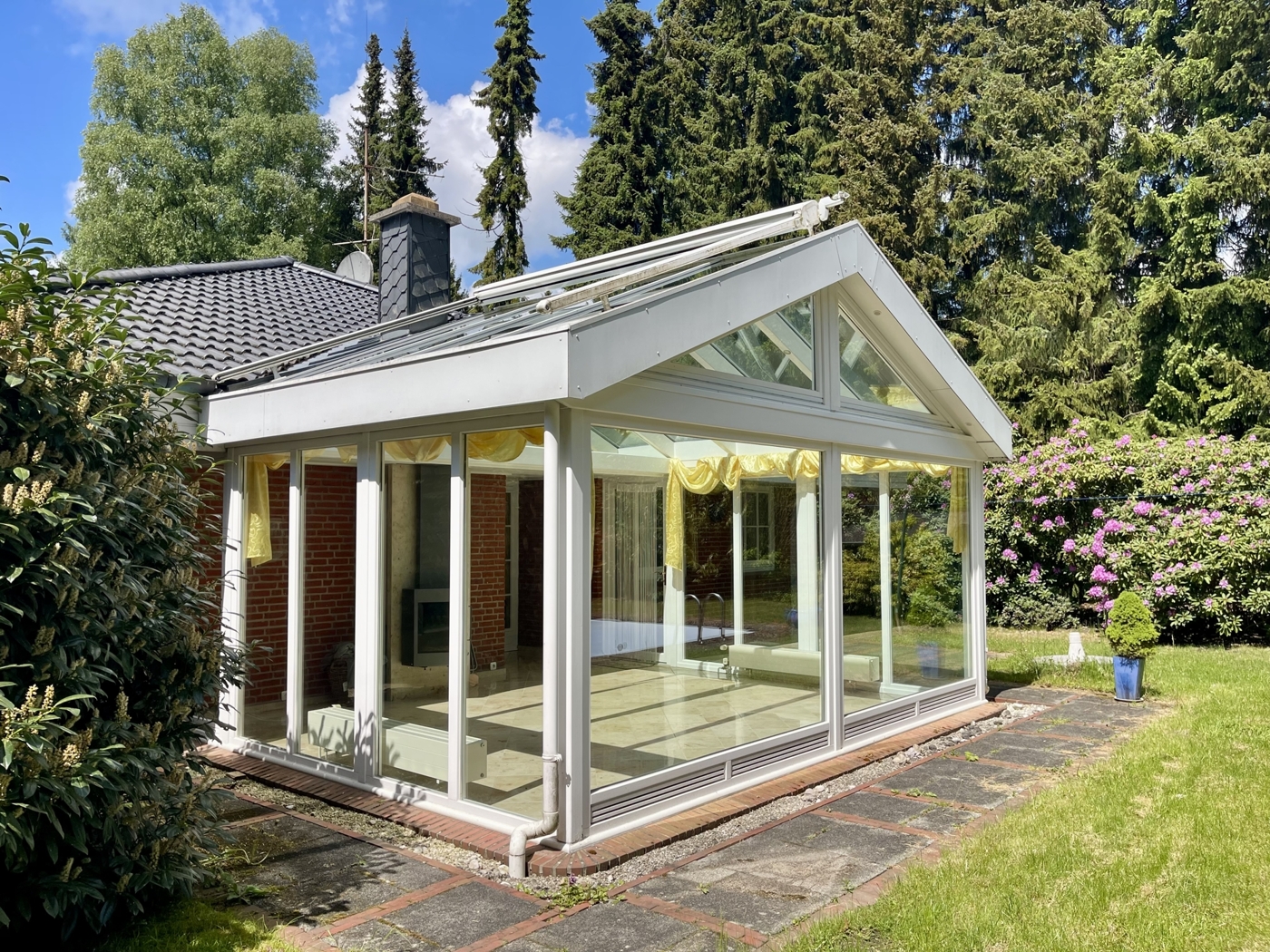Der Wintergarten mit Kaminofen