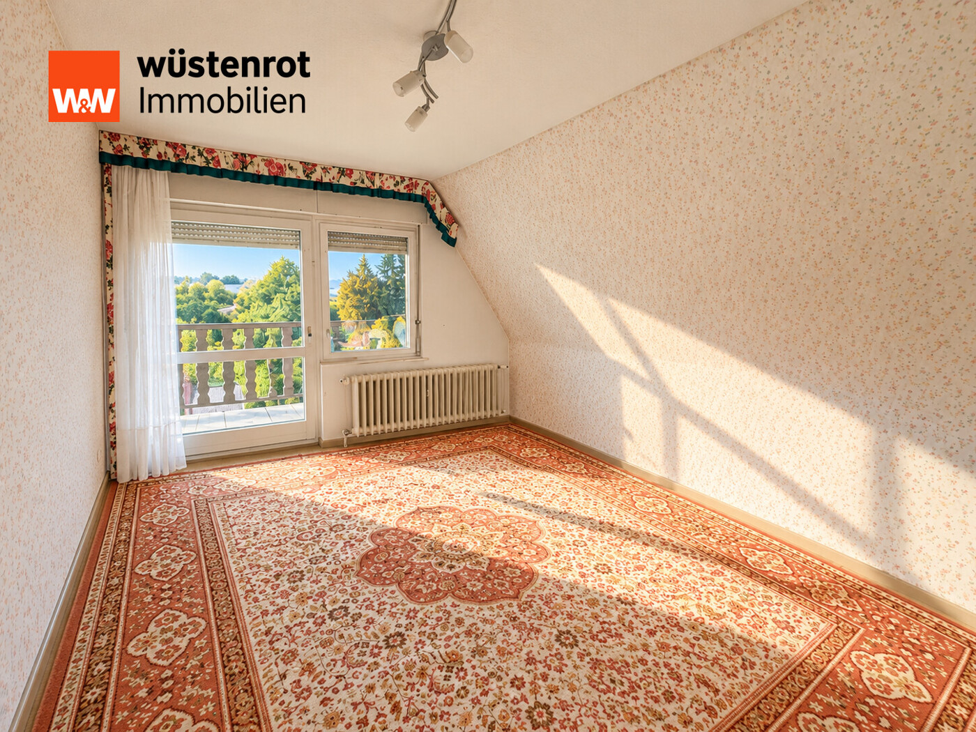 Schlafzimmer mit Balkonzugang