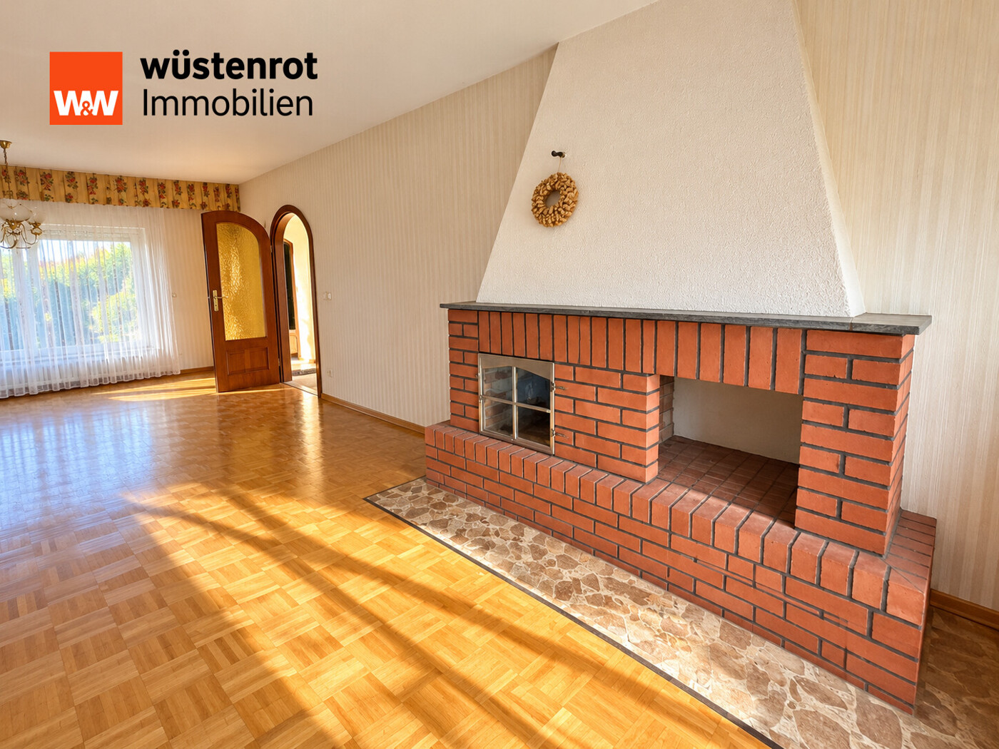 Wohnzimmer mit Kamin