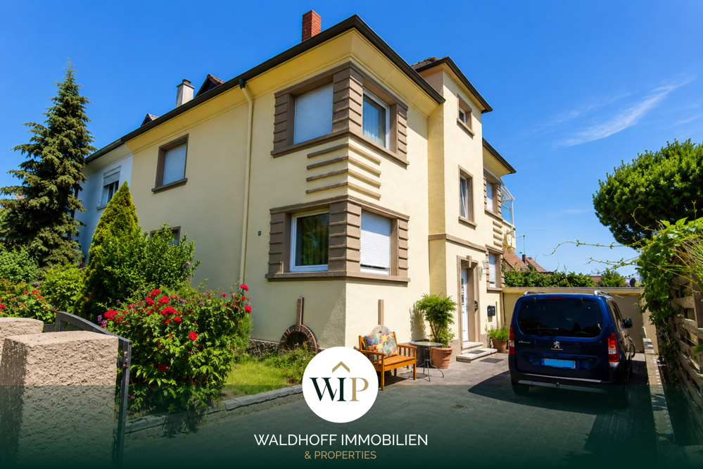Geräumiges 3-Familien-Doppelhaus mit Garten, Wintergärten und Doppelgarage in begehrter Lage