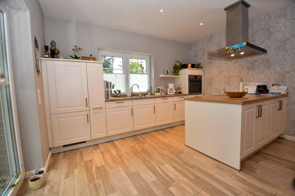 Idyllisches Wohnen auf dem Land – Charmante Erdgeschosswohnung mit Einbauküche und Garten in Augustendorf - Photo 4