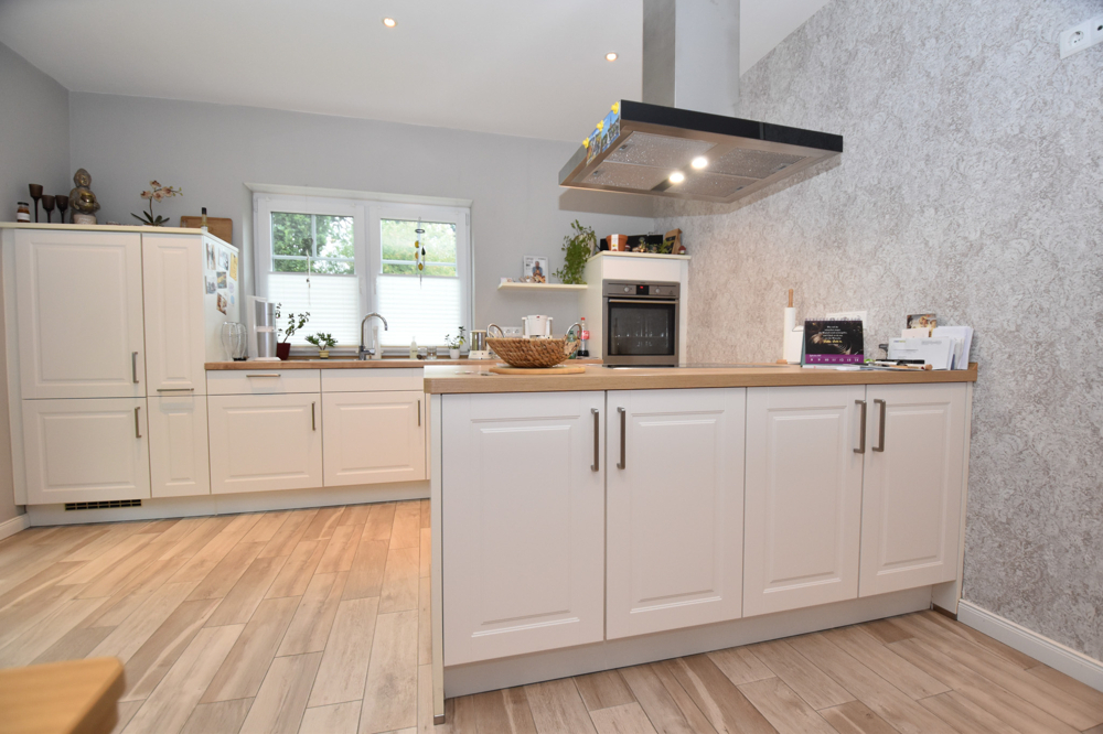 Idyllisches Wohnen auf dem Land – Charmante Erdgeschosswohnung mit Einbauküche und Garten in Augustendorf - Photo 5