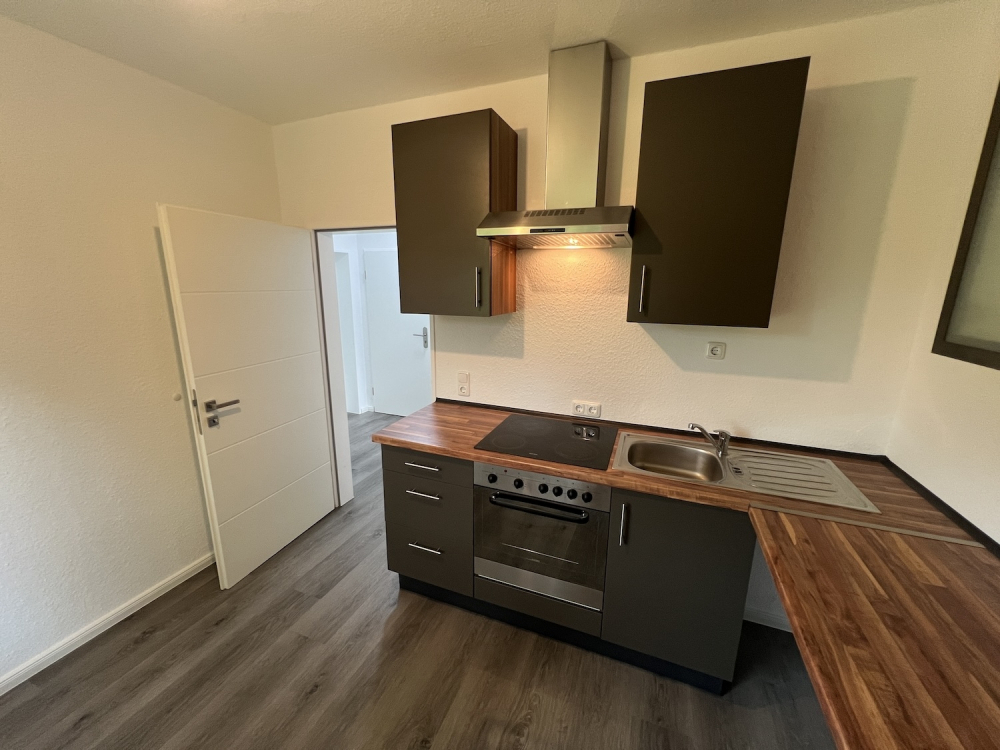Modern sanierte 1-Zimmer-Erdgeschosswohnung mit Einbauküche und Stellplatz in Jever-Rahrdum - Photo 5