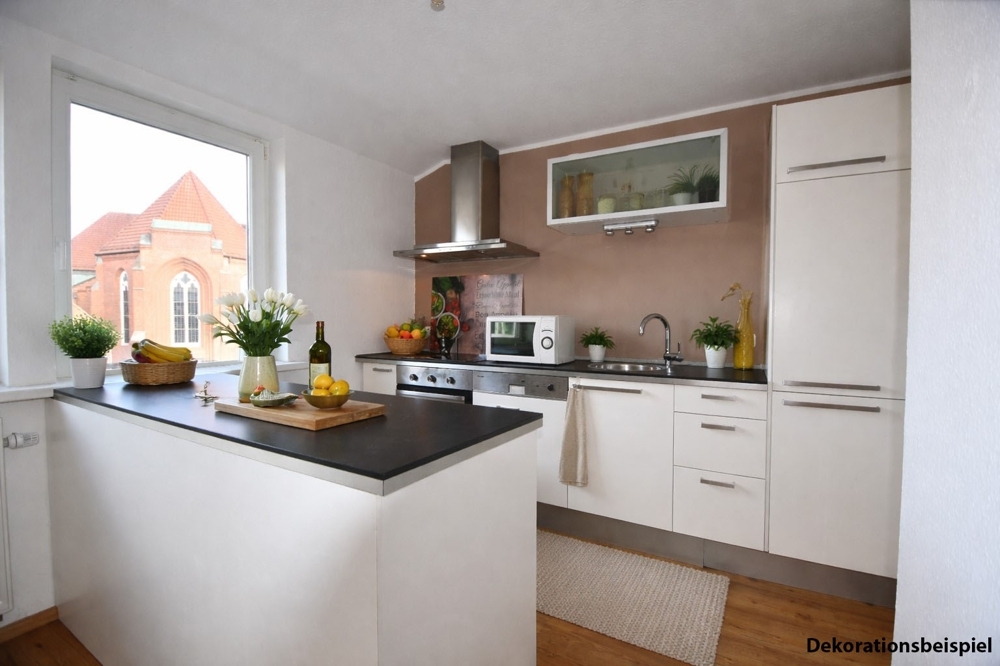 In perfekter, zentraler Lage in Friesoythe wohnen! Top-gepflegte Dachgeschosswohnung mit Einbauküche und Südbalkon - Photo 5