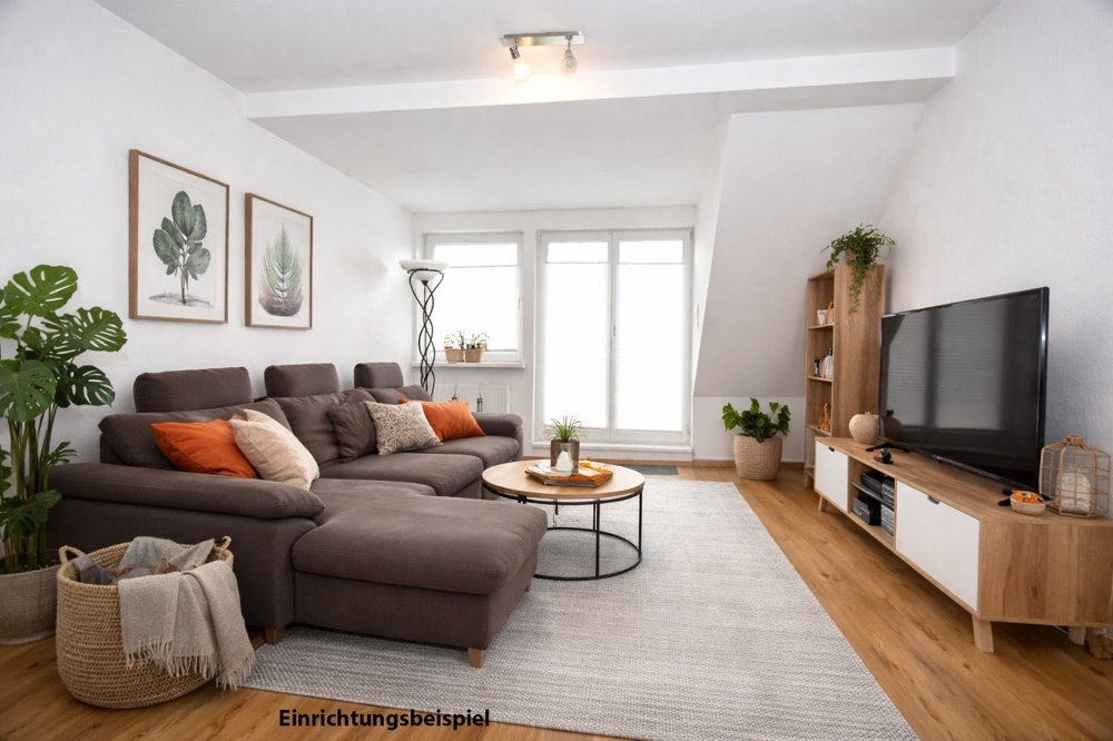 In perfekter, zentraler Lage in Friesoythe wohnen! Top-gepflegte Dachgeschosswohnung mit Einbauküche und Südbalkon - Photo 1