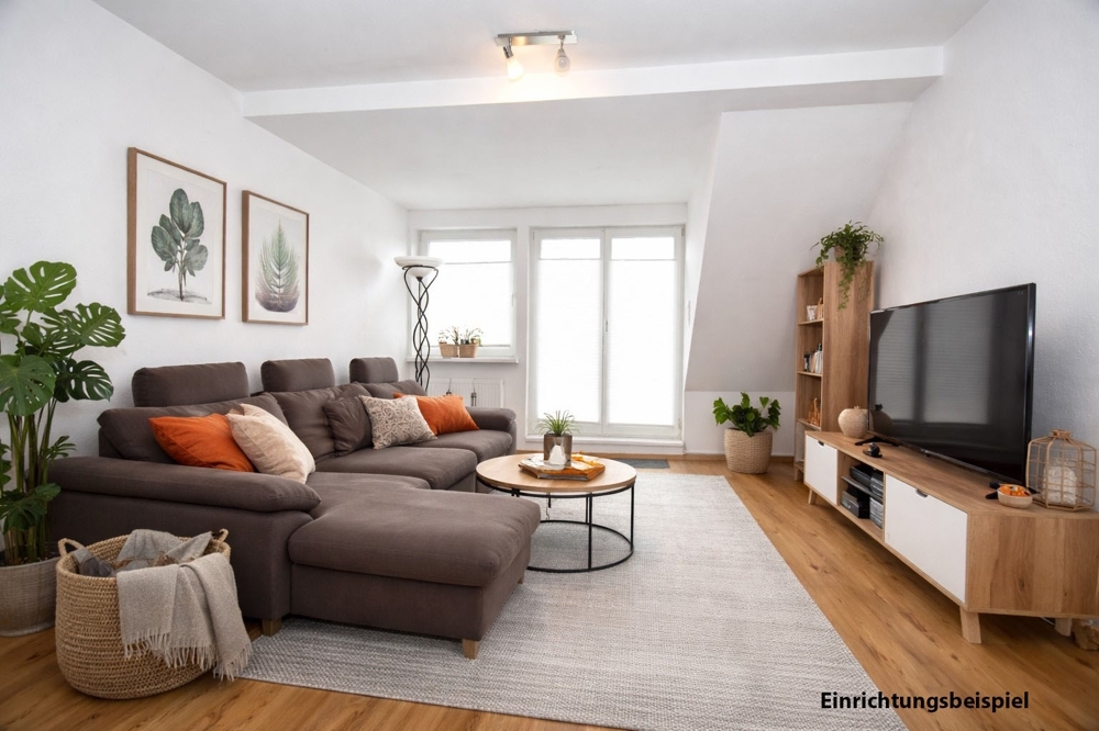 In perfekter, zentraler Lage in Friesoythe wohnen! Top-gepflegte Dachgeschosswohnung mit Einbauküche und Südbalkon - Photo 2