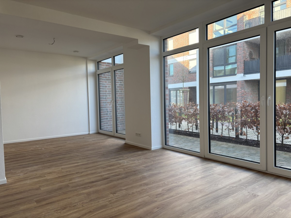 Erstebezug: Schöne Erdgeschosswohnung direkt am Norder Tief! - Foto 1