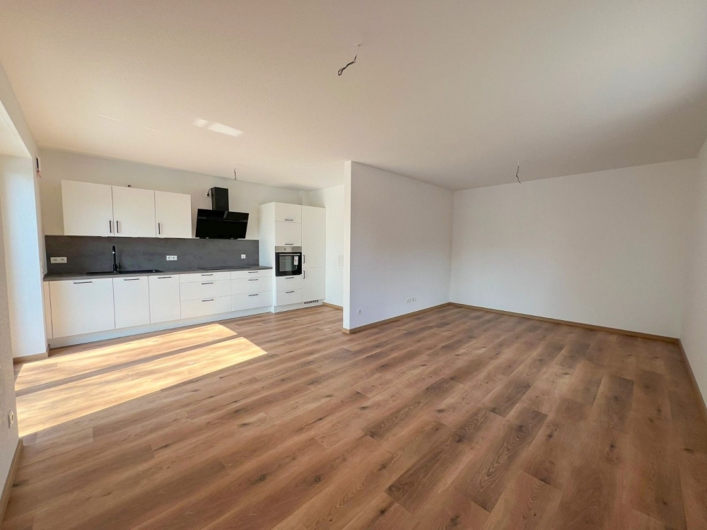 6635 - Stilvoll Wohnen im Neubau – Lichtdurchflutete 2,5-Zimmer-Wohnung mit EBK und Balkon - Photo 4