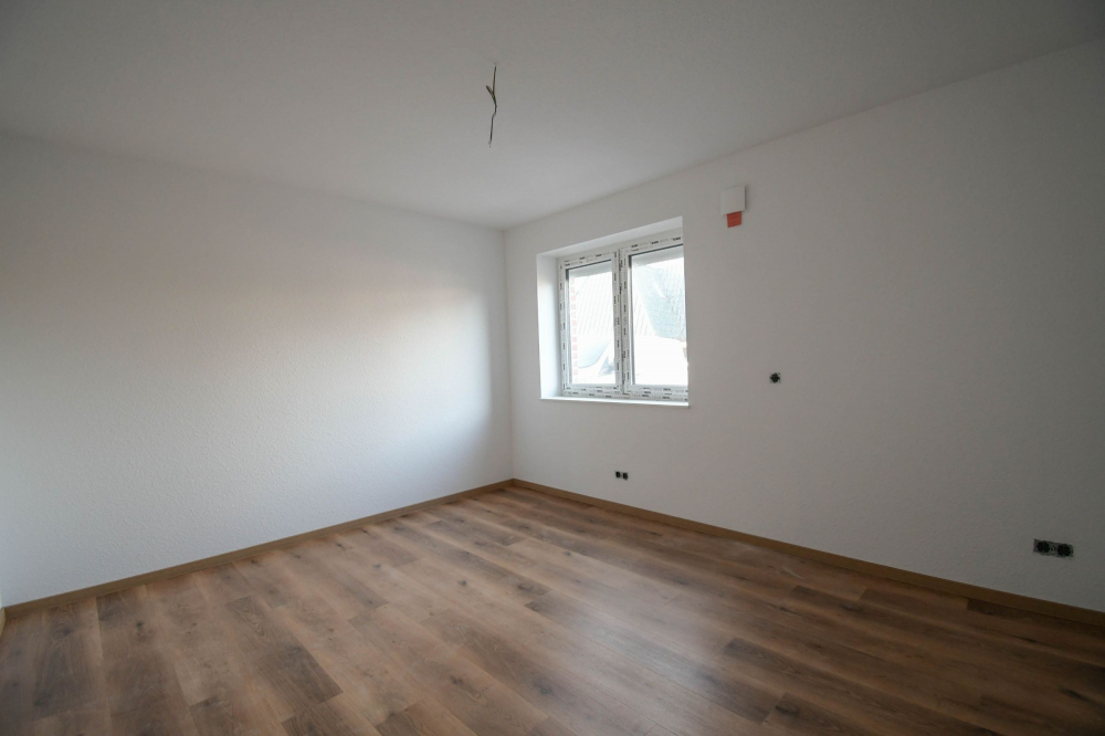 6644 - NEUBAU! Moderne Zwei-Zimmer-Erdgeschosswohnung mit Einbauküche in zentraler Lage - Foto 2