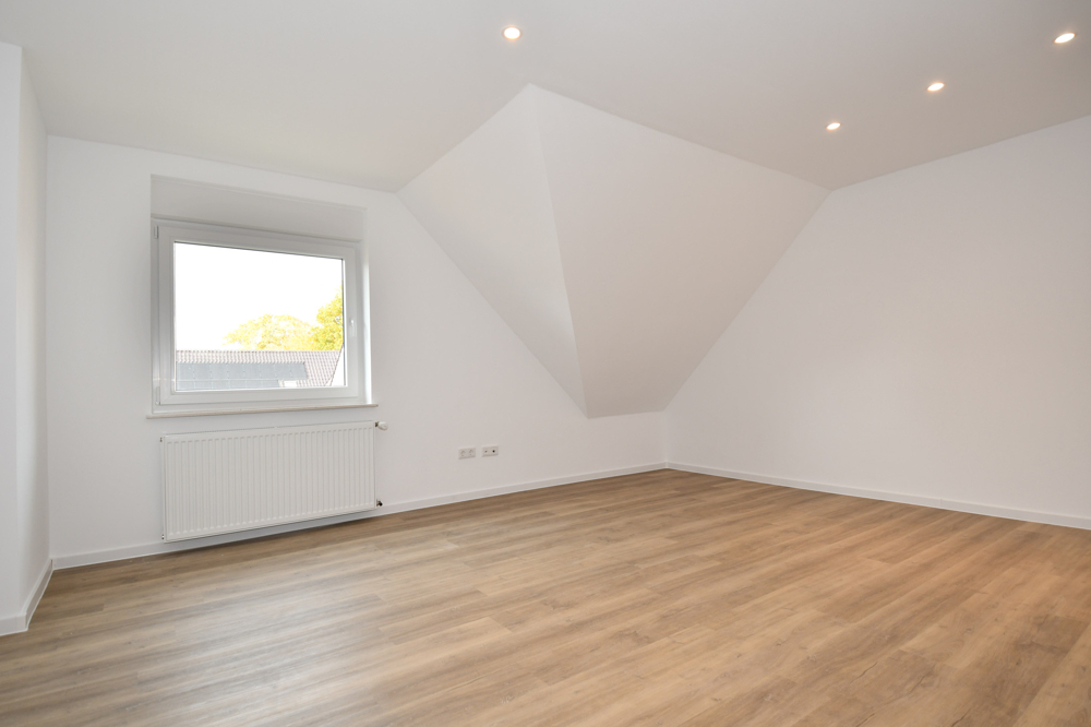 Wohnen mit Wohlfühlcharakter - Mietwohnung mit Balkon, Einbauküche und E-Ladestation in Altenoythe - Foto 3