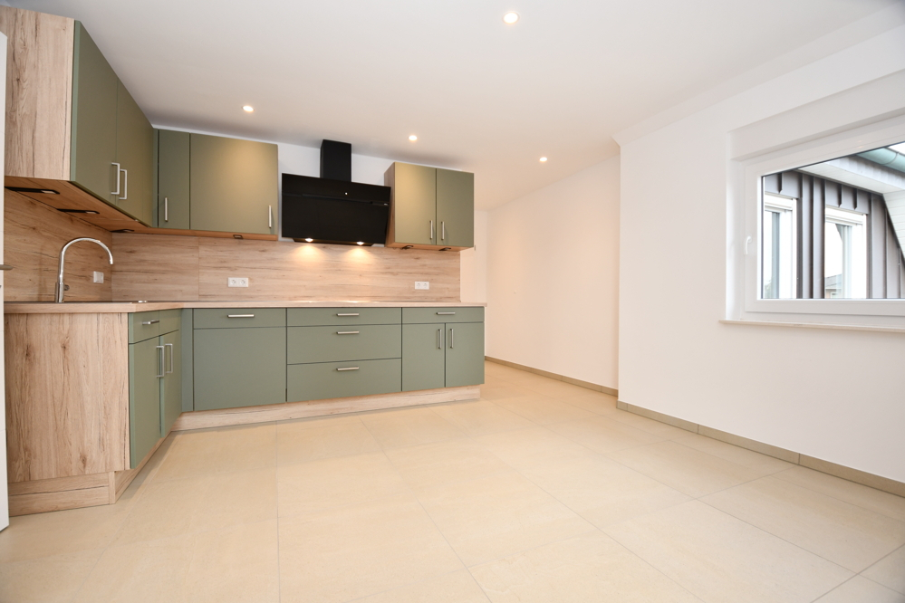 Wohnen mit Wohlfühlcharakter - Mietwohnung mit Balkon, Einbauküche und E-Ladestation in Altenoythe - Foto 4