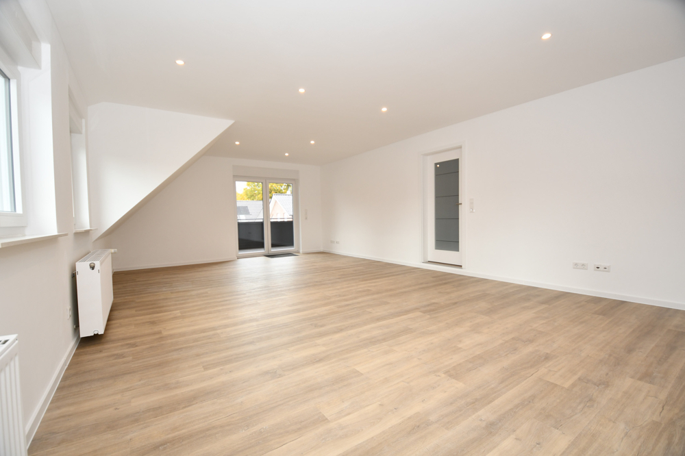 Wohnen mit Wohlfühlcharakter - Mietwohnung mit Balkon, Einbauküche und E-Ladestation in Altenoythe - Foto 1