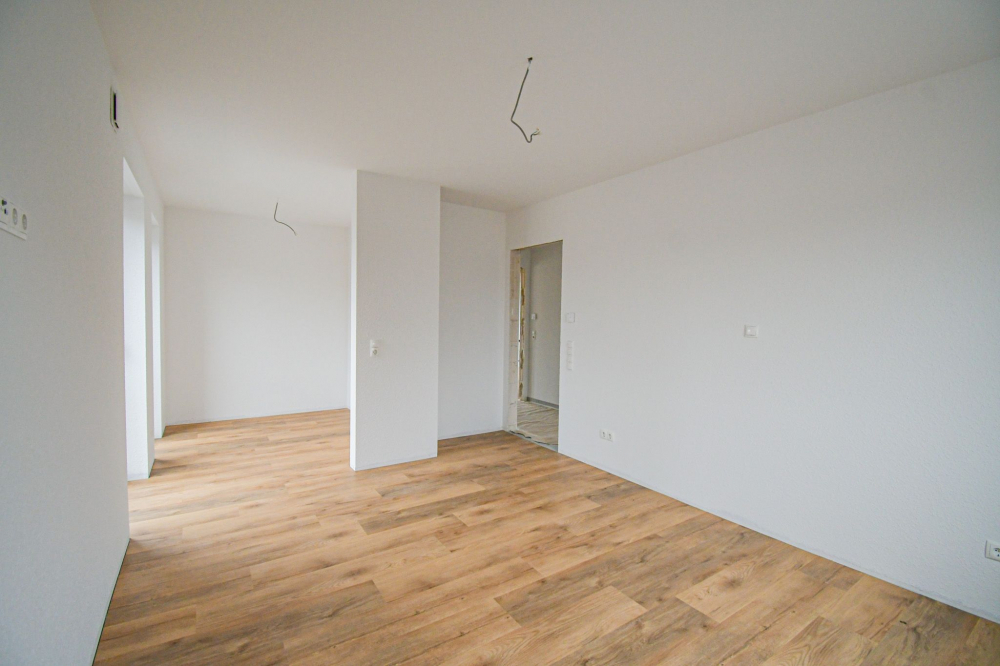 6663 - Hoch über dem Alltag – lichtdurchflutete 2-Zimmer-Wohnperle im 1. Obergeschoss! - Foto 1