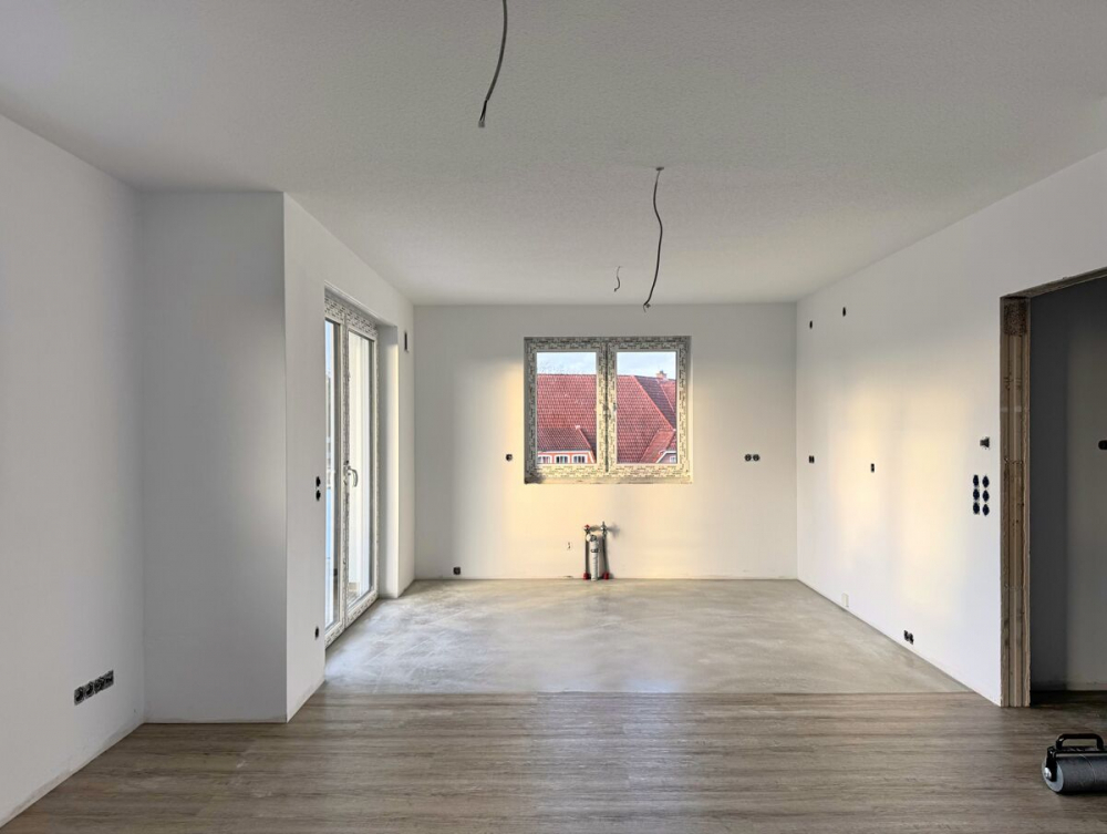 Ihr neues Zuhause: Neubau-Penthousewohnung mit Balkon inmitten von Remels - Uplengen - Foto 1