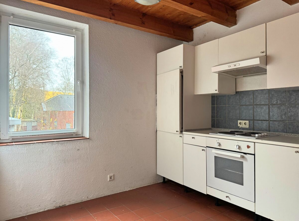 Renovierungsbedürftige 3ZKB-Maisonettewohnung in zentraler Lage der Blumenstadt Wiesmoor - Foto 2