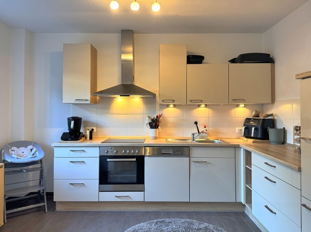 Gepflegtes Reihenmittelhaus mit Einbauküche, Terrasse und Carport in zentraler Lage von Wiesmoor - Foto 5