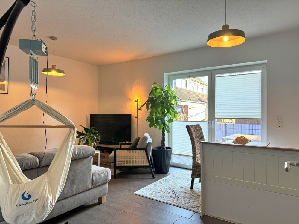 Gepflegtes Reihenmittelhaus mit Einbauküche, Terrasse und Carport in zentraler Lage von Wiesmoor - Foto 1