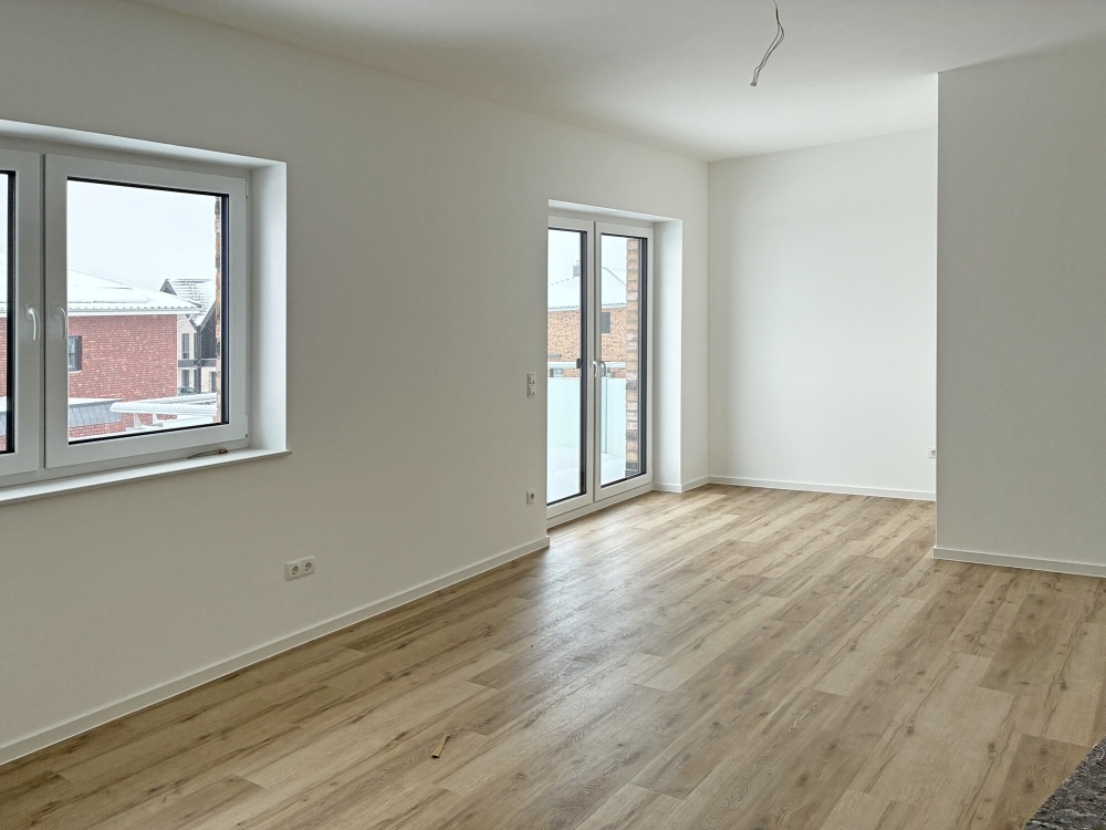 Erstbezug! - Schicke 2-Zimmer-Oberwohnung mit Balkon - Foto 1