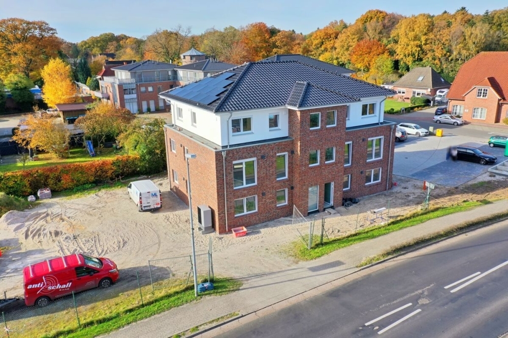 Erstbezug: Energiesparende Penthousewohnung mit Balkon im Herzen von Remels - Foto 5