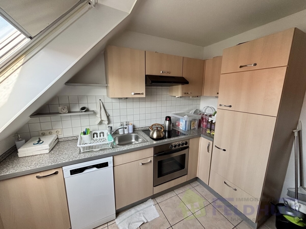 Gemütliche 2-Zimmer-Oberwohnung mit ausgebauten Spitzboden in Moormerland-Veenhusen! - Foto 2