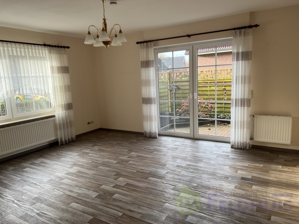 Gemütlich wohnen: Erdgeschosswohnung mit Terrasse in Veenhusen! - Foto 1