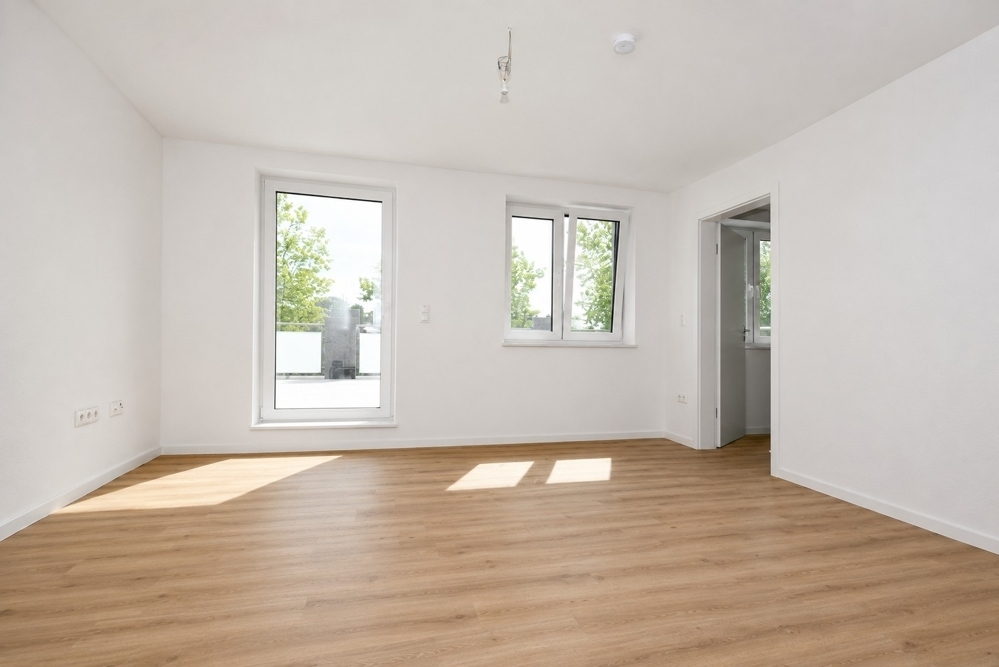 Erstbezug - Neubauwohnung mit Einbauküche, Dachterrasse mit Markise und PKW-Stellplatz in Altenoythe - Photo 1