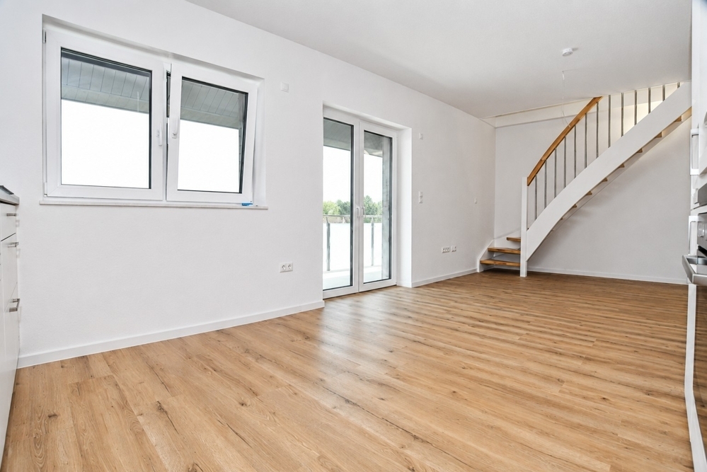 Erstbezug - Neubauwohnung mit Einbauküche, Balkon und PKW-Stellplatz in Altenoythe - Photo 1