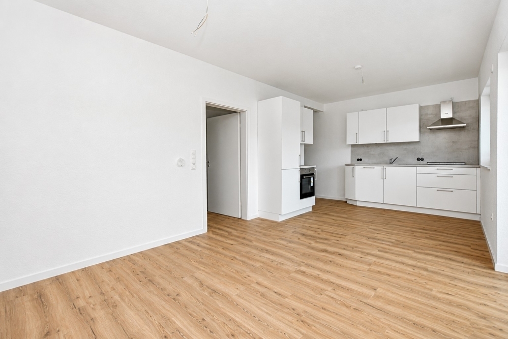 Erstbezug - Neubauwohnung mit Einbauküche, Balkon und PKW-Stellplatz in Altenoythe - Photo 3