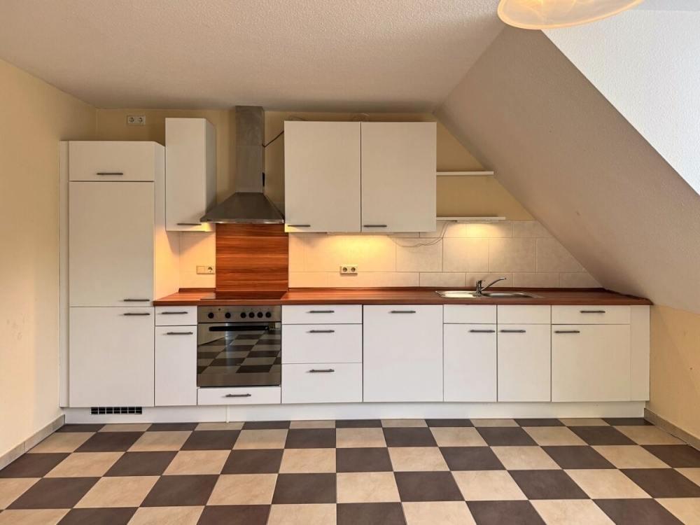 Attraktive Dachgeschosswohnung mit Einbauküche in Toplage von Wiesmoor - Foto 5