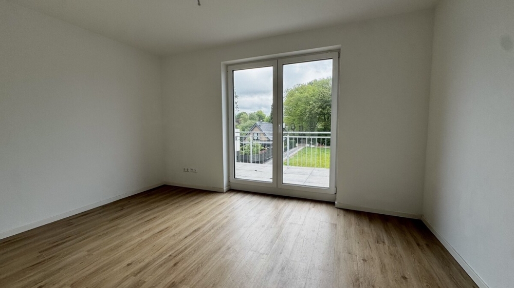 Großzügige 3-Zimmer-Wohnung mit Einbauküche und Dachterrasse in Osternburg - Foto 2