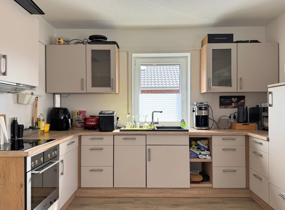 Neuwertige Erdgeschosswohnung mit Terrasse und Carport in Großefehn-Holtrop - Foto 1