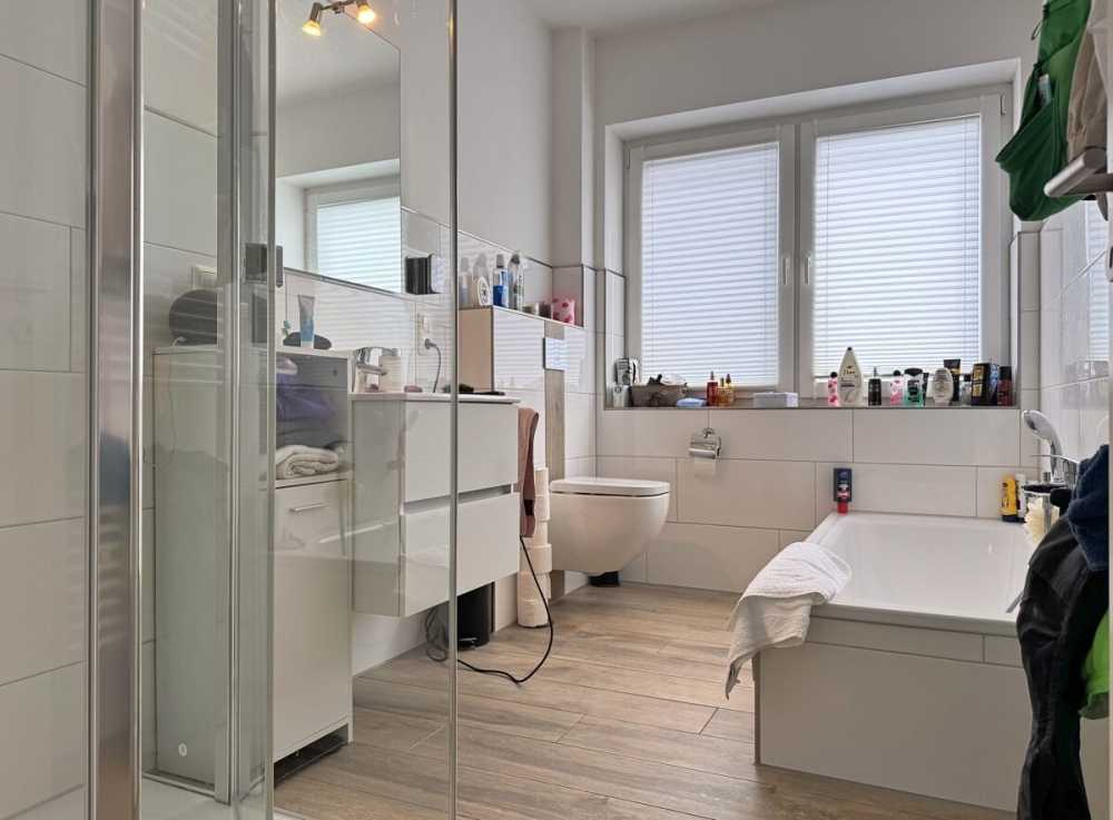 Neuwertige Erdgeschosswohnung mit Terrasse und Carport in Großefehn-Holtrop - Foto 3