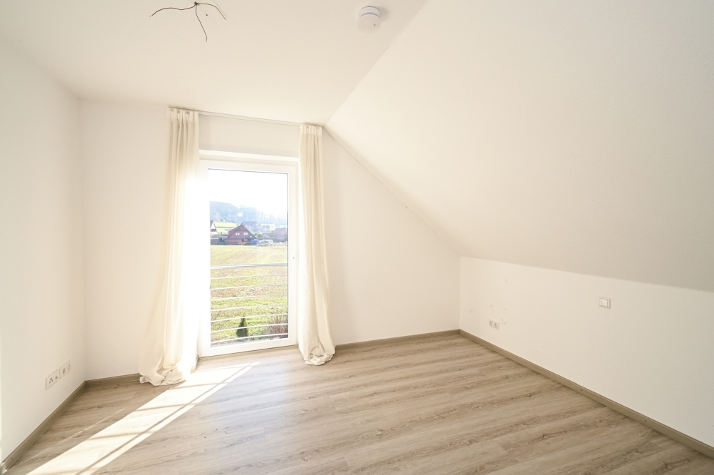 Modernes Wohnen in bester Lage – mit unverbaubarem Blick ins Grüne! - Foto 4