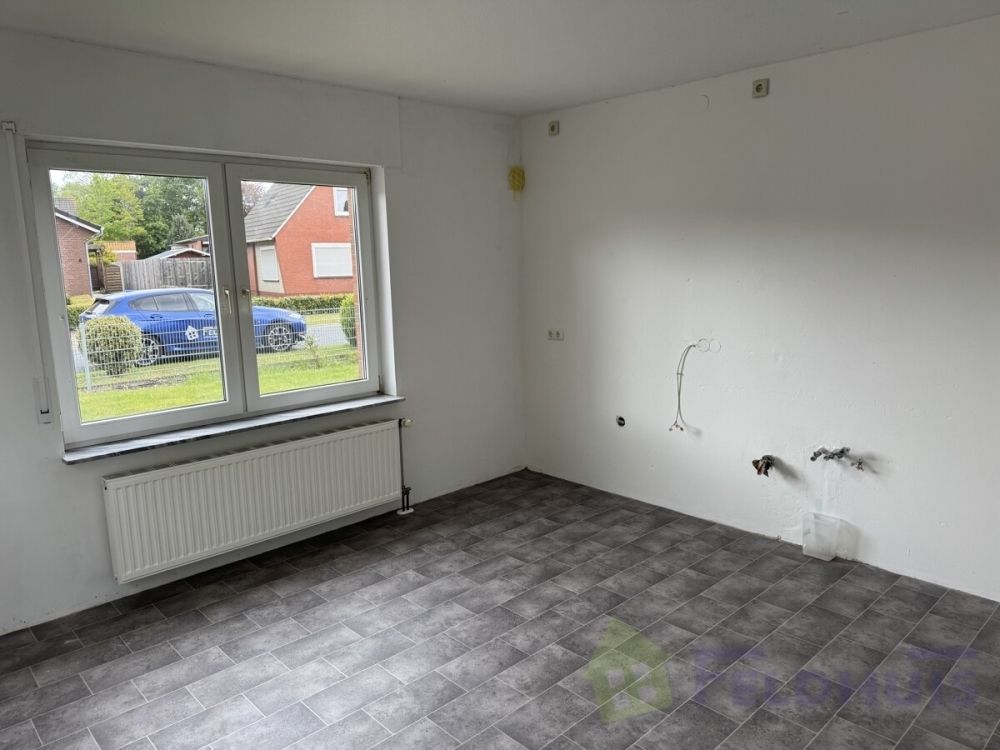 Geräumiges Wohnen in ruhiger Siedlungslage – 4-Zimmer-Wohnung in Warsingsfehn! - Foto 4