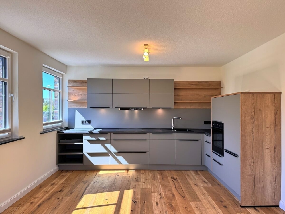 Liebevoll sanierte Oberwohnung mit hochwertiger Einbauküche in Friedeburg - Foto 1