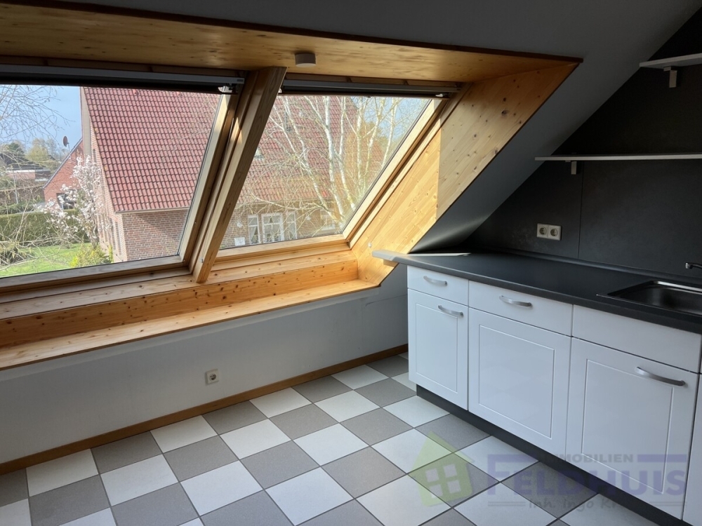 Helle und gemütliche Obergeschosswohnung in ruhiger Sackgassenlage von Warsingsfehn! - Foto 1