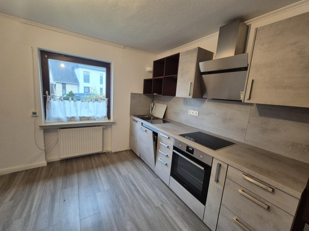 Großzügiges Wohnhaus mit zwei Wohneinheiten, Garagen, Keller und Garten in Kirchseelte - Foto 4