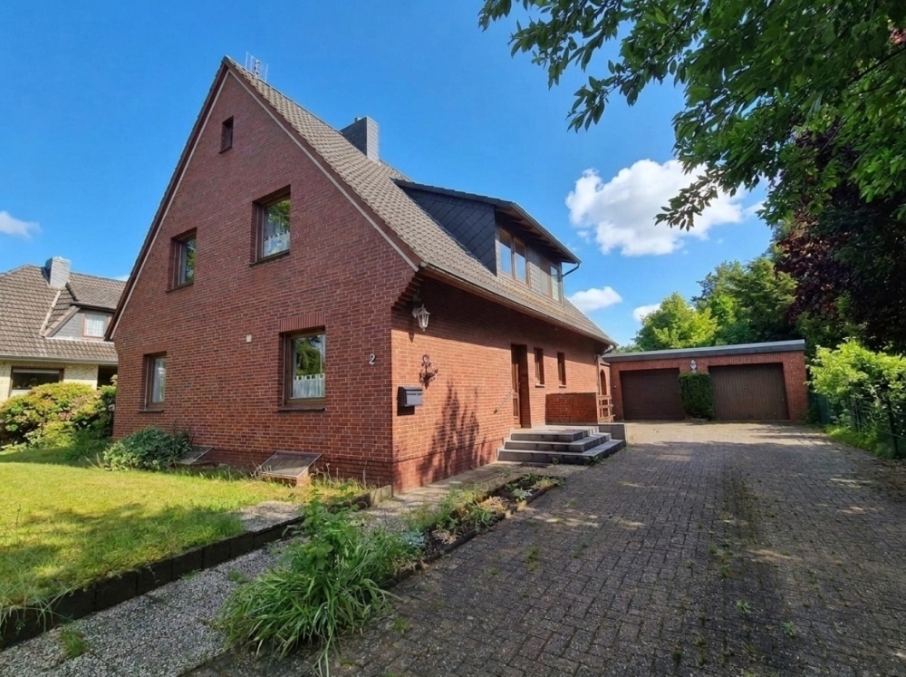 Großzügiges Wohnhaus mit zwei Wohneinheiten, Garagen, Keller und Garten in Kirchseelte - Foto 5