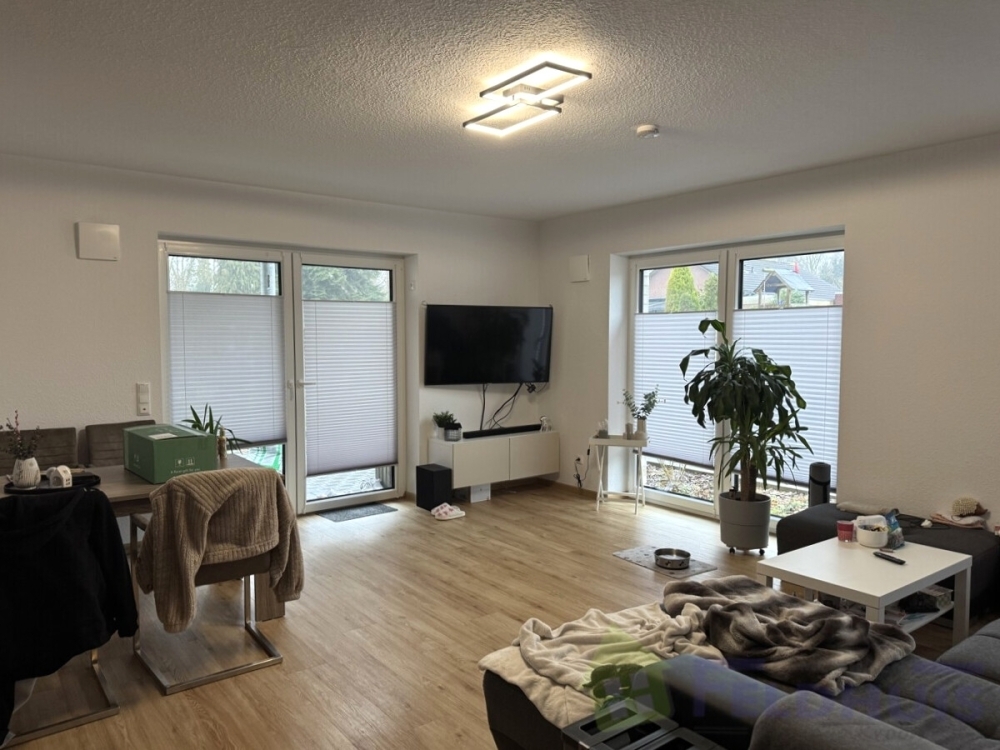 Ihr neues Zuhause: Energieeffiziente 3-Zimmer-Erdgeschosswohnung mit gemütlicher Terrasse in Warsingsfehn! - Photo 1