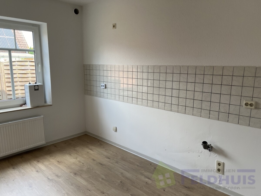Aufgepasst! 3-Zimmer-Erdgeschosswohnung im Zentrum von Warsingsfehn. - Photo 2