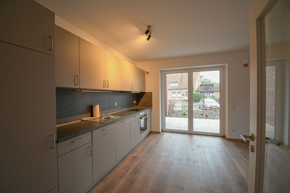 6644 - NEUBAU! Moderne Zwei-Zimmer-Erdgeschosswohnung mit Einbauküche in zentraler Lage - Photo 2