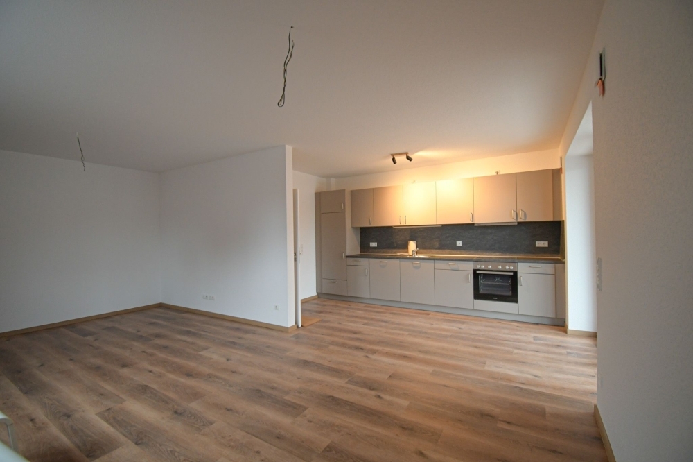 6644 - NEUBAU! Moderne Zwei-Zimmer-Erdgeschosswohnung mit Einbauküche in zentraler Lage - Photo 3