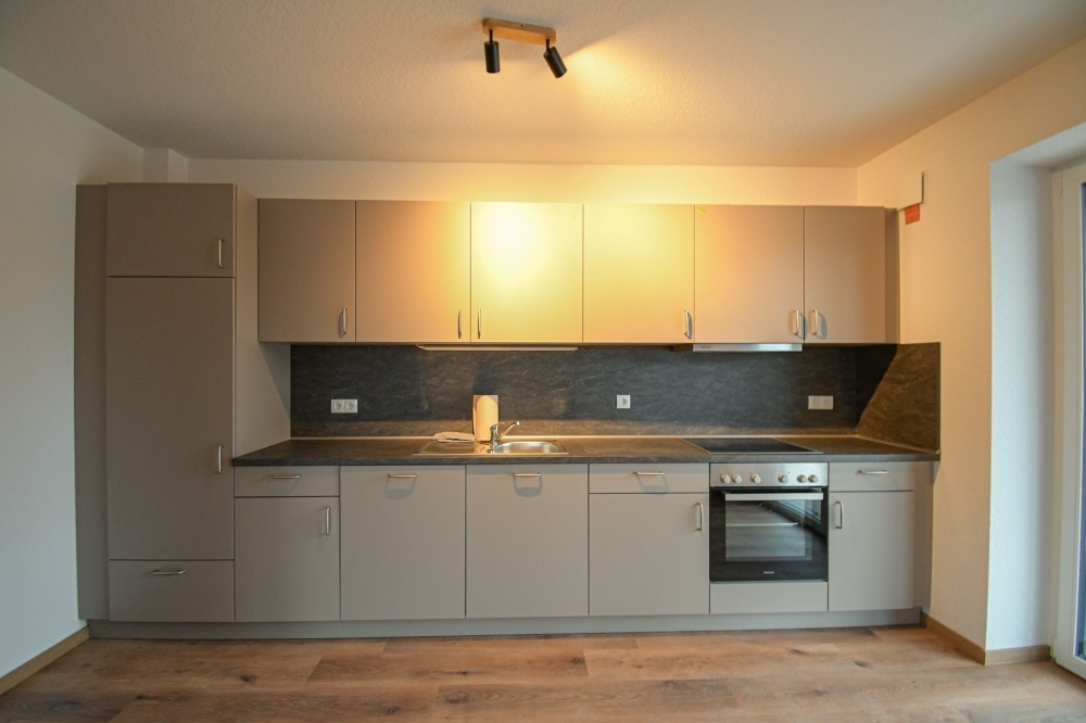 6644 - NEUBAU! Moderne Zwei-Zimmer-Erdgeschosswohnung mit Einbauküche in zentraler Lage - Photo 4
