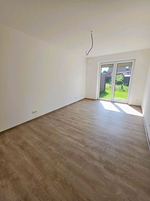 Erstbezug, moderne Erdgeschosswohnung mit Terrasse und Carport in Westoverledingen - Foto 2