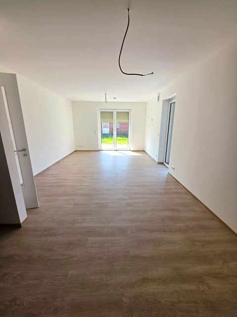 Erstbezug, moderne Erdgeschosswohnung mit Terrasse und Carport in Westoverledingen - Foto 1