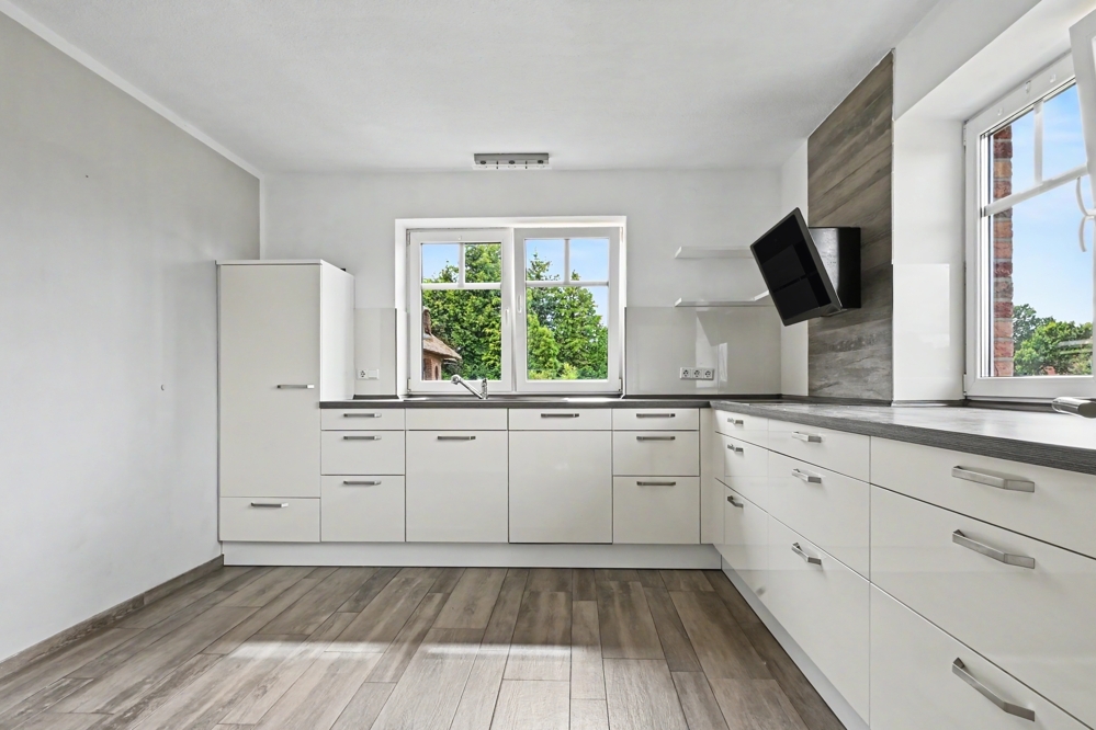 Modernes und neuwertiges Familienhaus in Kanallage von Südgeorgsfehn | 188 m² Wohnfläche - Foto 2